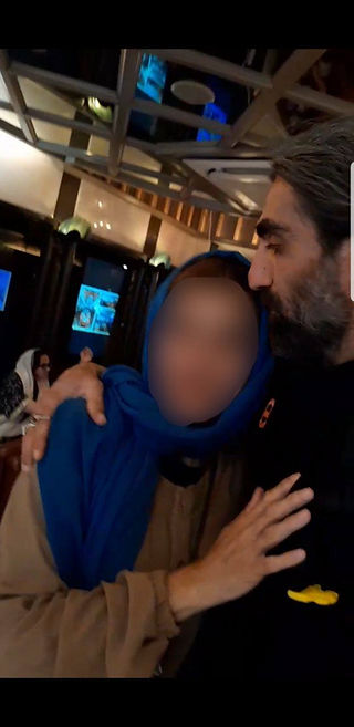 Mohammedreza kissing his mother farewell in Turkey