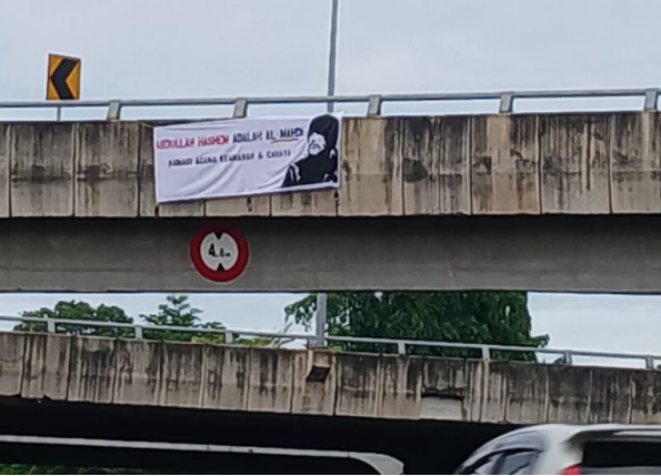 Malaysian believers hang banners of Aba Al-Sadiq on January 16, 2025