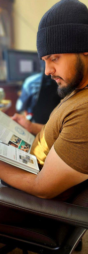 A man at the Ahmadi Religion of Peace and Light headquarters in Crewe read the magazine