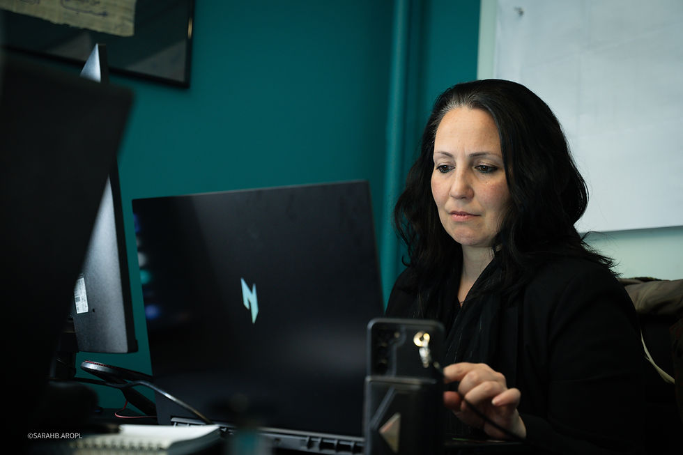 Beyda working on her laptop in Webb House Crewe