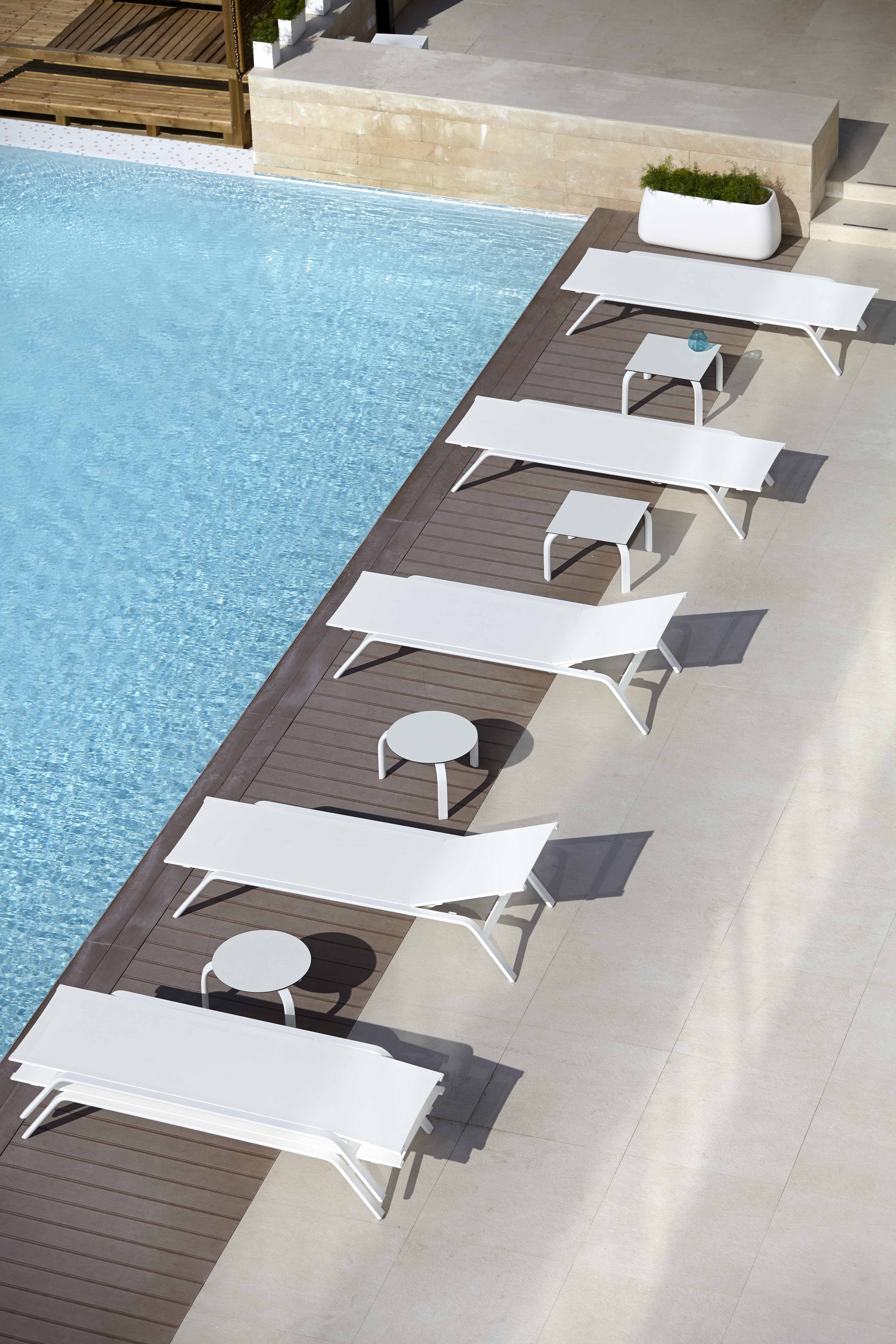 stack-chaiselongues-and-tables-for-chaiselongues-ambience-image