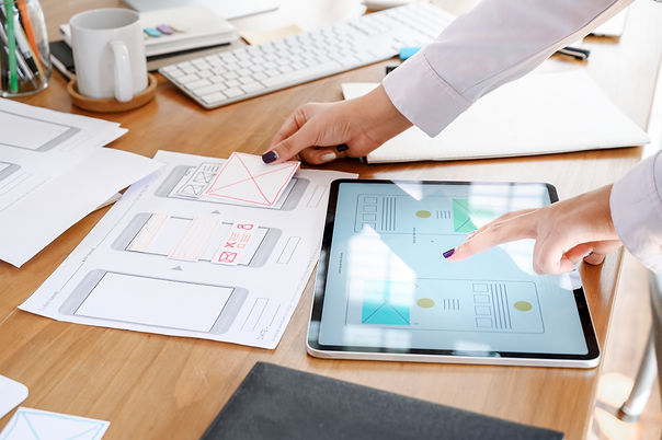 UX-designer-team-using-tablet-designing-