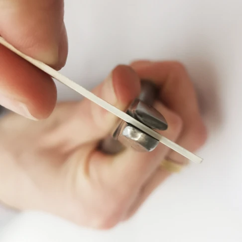 Shaping a piece of metal into a ring shape