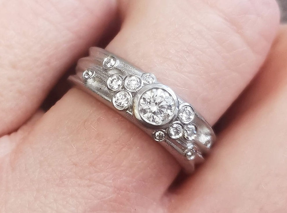 multi diamond ocean inspired platinum engagement ring by Kate Smith Jewellery