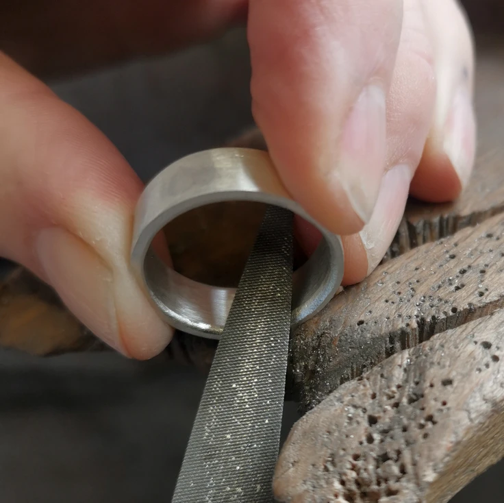 Silver ring making process - curving the edges with a file