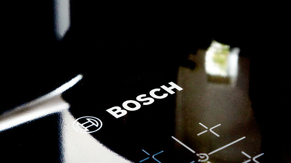 Image of a patio from a drone hovering in the trees