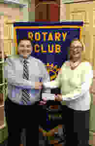 Kevin Hill, President of the Oswego Sunrise Rotary Club with Teresa Woolson, President of VOW