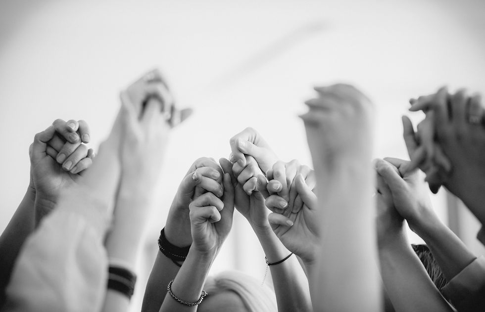 Hands Raised Together_edited.jpg