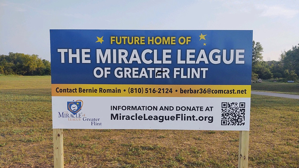 A sign indicating the location of the new MLGF field at Mundy Miracle Commons.