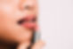 woman-holding-a-pink-lipstick-925381.jpg