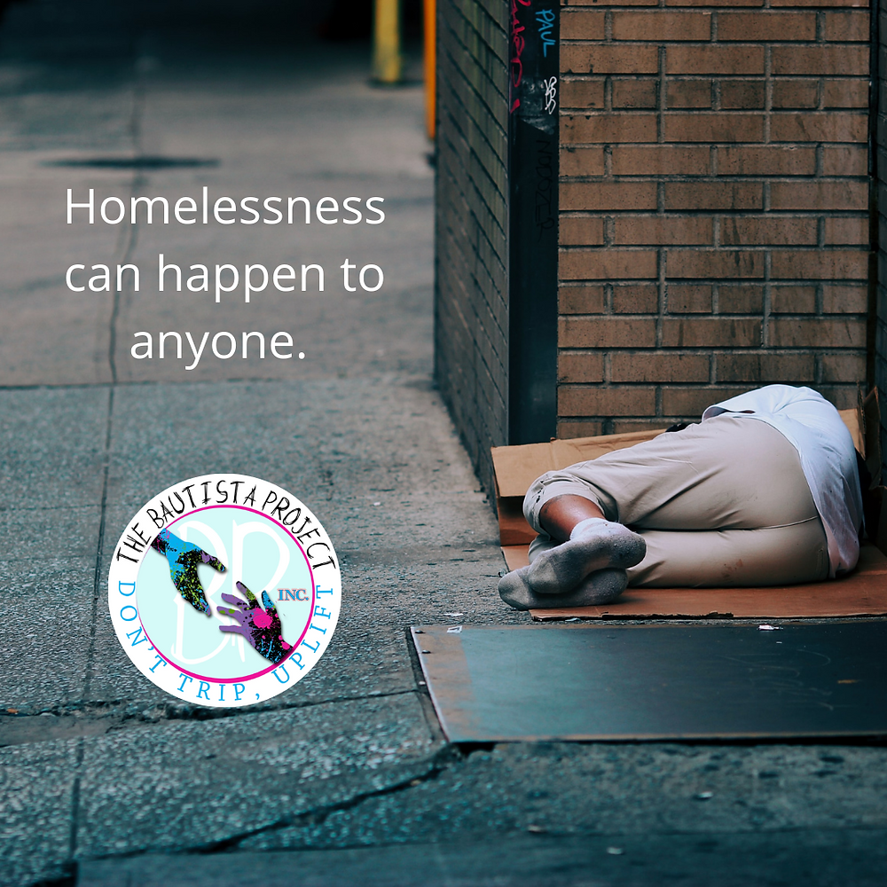a homeless woman sleeping in a doorway on a broken down cardboard box for a mat