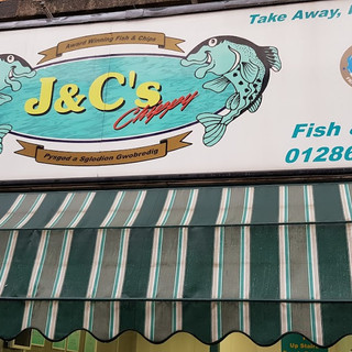 J&C's Chippy, Chippys in caernarfon, caernarfon chippys, best chippys in wales, best chippys in north wales, chip shops in wales, best chippys in the uk, fish and chips caernarfon, visit caernarfon, visit, caernarfon ltd, Visit Caernarfon, Caernarfon, Visit Wales, Whats in Caernarfon, What does caernarfon offer, where to go in Caernarfon, what to do in caernarfon, caernarfon attractions, caernarfon landmarks, north wales hoidays, holiday in wales, holiday in caernarfon, breaks away, uk getaways, uk holiday, holiday at home, holiday in britain, british holiday, uk culture, whats in the UK, Gwynedd, visiting caernarfon, directions to caernarfon, mount snowdon, snowdonia, caernarfon castle, visit caernarfon castle, north wales, cymru, visiting north wales, where to stay and eat in north wales, pubs in caernarfon, the albert inn, the crown caernarfon, the legion caernarfon, four alls caernarfon, the black boy caernarfon, wal caernarfon, stones bistro caernarfon, palace vaults caernarfon, gypsy wood park, greenwoods caernarfon, morgan lloyd caernarfon, shops in caernarfon, gold n treasures caernarfon, the eagles caernarfon, eagles pub caernarfon,