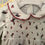Thumbnail: Full body baby onesie white, printed birds.