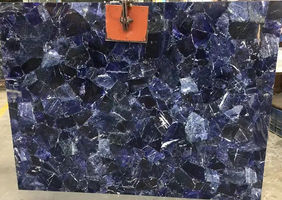 Indulge in the beauty of Duramica Sodalite Panels—GemStone is a large-format panel that features the mesmerizing blue and white patterns of sodalite, providing a sophisticated and unique upgrade to your decor. English:
Discover the unique charm of Duramica Sodalite Panels—GemStone is a large-format panel featuring the striking blue tones and white veining of Sodalite, adding a sophisticated and visually captivating element to any interior.

German:
Entdecken Sie den einzigartigen Charme der Duramica Sodalith-Panels—diese großformatigen GemStone-Panels zeigen die auffälligen blauen Töne und weißen Adern des Sodalith, was jedem Innenraum ein anspruchsvolles und visuell fesselndes Element verleiht.

Spanish:
Descubre el encanto único de los paneles Duramica Sodalita—estos paneles GemStone de gran formato presentan los llamativos tonos azules y las venas blancas de Sodalita, agregando un elemento sofisticado y visualmente cautivador a cualquier interior.

French:
Découvrez le charme unique des panneaux Duramica Sodalite—ces panneaux GemStone grand format présentent les teintes bleues frappantes et les veines blanches du Sodalite, ajoutant un élément sophistiqué et visuellement captivant à tout intérieur.

Italian:
Scopri il fascino unico dei pannelli Duramica Sodalite—questi pannelli GemStone di grande formato presentano le sorprendenti tonalità blu e le venature bianche del Sodalite, aggiungendo un elemento sofisticato e visivamente affascinante a qualsiasi interno.

Arabic:
اكتشف السحر الفريد لألواح Duramica سودالايت—تتميز هذه الألواح الكبيرة من GemStone بألوانها الزرقاء اللافتة وعرقها الأبيض من سودالايت، مما يضيف عنصرًا متطورًا وجذابًا بصريًا إلى أي داخل.

Russian:
Откройте для себя уникальное очарование панелей Duramica Содалит — эти панели GemStone большого формата демонстрируют яркие синие оттенки и белые прожилки Содалит, добавляя изысканный и визуально привлекательный элемент в любой интерьер.

