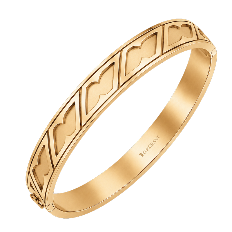 Luxury wide yellow gold cuff bracelet with satin finish and modern geometric relief pattern on a black background. سوار ذهبي