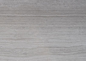 ENGLISH
Serpeggiante Grey (or Silver) marble features elegant horizontal veining in soft grey and silver tones. Ideal for modern interiors, it offers a refined, wood-like appearance with the durability of natural stone.

DEUTSCH
Serpeggiante Grey (oder Silver) ist ein Marmor mit eleganter, horizontaler Maserung in Grau- und Silbertönen. Perfekt für moderne Innenräume – eine edle, holzähnliche Optik mit der Robustheit von Naturstein.

ESPAÑOL
El mármol Serpeggiante Grey (o Silver) presenta vetas horizontales en tonos grises y plateados. Ideal para interiores modernos, combina una estética similar a la madera con la resistencia de la piedra natural.

FRANÇAIS
Le marbre Serpeggiante Grey (ou Silver) se caractérise par des veines horizontales dans des tons gris et argentés. Parfait pour des intérieurs modernes, il allie l’élégance naturelle à un aspect proche du bois.

ITALIANO
Il marmo Serpeggiante Grey (o Silver) presenta venature orizzontali nei toni del grigio e dell’argento. Ideale per interni moderni, unisce l’eleganza della pietra naturale a un aspetto simile al legno.

РУССКИЙ
Мрамор Serpeggiante Grey (или Silver) отличается горизонтальными прожилками серого и серебристого оттенков. Идеален для современных интерьеров — сочетает изысканный вид с прочностью натурального камня.