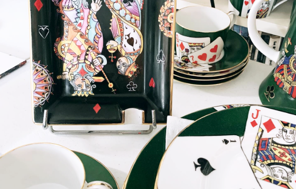 Porcelain Poker Mugs and Plates: The hand-painted porcelain coffee mugs and poker-themed dinner or dessert plates in this collection add a touch of elegance to any table setting. Perfectly crafted from Limoges porcelain for both everyday use and special occasions.