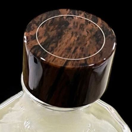 Handcrafted stone bottle stoppers in obsidian and marble, unique bespoke objects