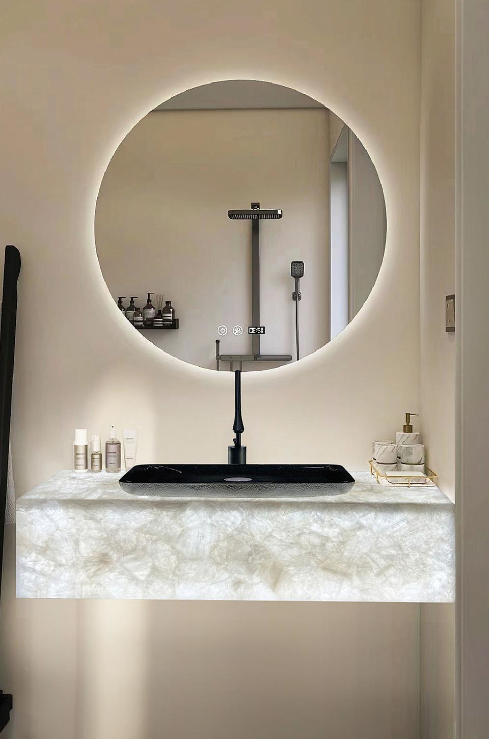 Final Thoughts: If you seek unparalleled elegance and luxurious aesthetics, both materials are excellent choices. Both can be backlit. Onyx stands out with its large, continuous patterns, while quartz offers a unique appeal as a panel composed of smaller pieces.