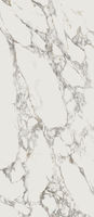 English:
Calacatta Vaglie SG – ultra-thin large-format porcelain tiles with white marble effect. Ideal for interior and facade cladding. Available in satin and polished finishes. Durable sintered stone panels combine beauty and strength.
German:
Calacatta Vaglie SG – ultradünne Großformat-Porzellanfliesen mit weißem Marmor-Effekt. Perfekt für Innen- und Fassadenverkleidungen. Satinierte und polierte Oberflächen. Robuste gesinterte Steinplatten vereinen Ästhetik und Haltbarkeit.
Spanish:
Calacatta Vaglie SG – azulejos de porcelana de gran formato ultrafinos con efecto mármol blanco. Ideal para revestimientos interiores y fachadas. Acabados satinado y pulido. Paneles de piedra sinterizada resistentes y elegantes.
French:
Calacatta Vaglie SG – carreaux de porcelaine grand format ultra-fins effet marbre blanc. Parfait pour intérieur et façades. Finitions satinées et polies. Panneaux en pierre frittée durables alliant beauté et robustesse.
Italian:
Calacatta Vaglie SG – piastrelle in gres porcellanato ultrasottili formato grande con effetto marmo bianco. Ideale per rivestimenti interni e facciate. Finiture satinate e lucide. Pannelli in pietra sinterizzata resistenti e belli.
Russian:
Calacatta Vaglie SG – ультратонкий крупноформатный керамогранит с эффектом белого мрамора. Для интерьера и фасадов. Сатинированная и полированная поверхность. Прочные панели из спечённого камня.
Arabic:
كالاكاتا فاجلي SG – بلاط بورسلان كبير الحجم ونحيف جدًا بتأثير الرخام الأبيض. مثالي للتكسية الداخلية والواجهات. تشطيبات ساتان ومصقولة. ألواح حجرية مصهورة تجمع بين الجمال والمتانة.