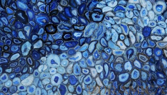 Duramica GemStone blue agate panels offer a unique blend of natural beauty and ceramic durability, perfect for countertops, furniture, and flooring.