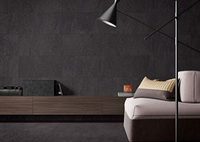 Skinlam Basaltina Negro SG is a thin large-format porcelain stoneware designed for façades and interiors, featuring a minimum thickness of 3 mm and a refined stone-effect finish.
This collection offers large-format stone-look panels inspired by the texture of volcanic basalt. Subtle and elegant, it comes in three sophisticated shades — black, anthracite, and beige — and offers great versatility across a range of formats.
Discreet yet adaptable, the Basaltina collection seamlessly fits both contemporary and traditional design settings.