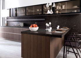 Brown Barocco granite is a luxurious natural stone with deep brown tones, rich veining, and dynamic patterns. Ideal for countertops, floors, and wall cladding, it adds warmth and elegance to both classic and modern interiors.
DE
Brown Barocco Granit ist ein edler Naturstein mit tiefen Brauntönen, markanter Maserung und dynamischem Muster. Perfekt für Arbeitsplatten, Böden und Wandverkleidungen – er verleiht jedem Raum Wärme und Eleganz.
ES
El granito Brown Barocco destaca por sus tonos marrones intensos, vetas ricas y patrones dinámicos. Ideal para encimeras, suelos y paredes, aporta calidez y sofisticación a cualquier ambiente.
FR
Le granit Brown Barocco présente de profonds tons bruns, des veines riches et des motifs dynamiques. Parfait pour plans de travail, sols et murs, il apporte chaleur et élégance aux intérieurs classiques ou modernes.
IT
Il granito Brown Barocco ha tonalità marroni intense, venature ricche e disegni dinamici. Perfetto per piani cucina, pavimenti e rivestimenti, aggiunge calore ed eleganza agli ambienti classici e contemporanei.
AR
غرانيت Brown Barocco يتميّز بدرجات بنية غنية وعروق واضحة وأنماط ديناميكية. مثالي لأسطح المطابخ والأرضيات وتكسية الجدران، ويمنح الدفء والفخامة للمساحات الكلاسيكية والعصرية.
RU
Гранит Brown Barocco — это благородный натуральный камень с насыщенными коричневыми оттенками, выразительными прожилками и динамичным рисунком. Идеален для столешниц, полов и стен, придавая интерьеру тепло и элегантность.