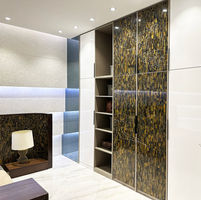 Experience the refined beauty of Duramica Tiger Eye Blue / Tiger Eye Gold Blue Panels—meticulously crafted from polished tiger’s eye, these panels boast a harmonious blend of blue and gold tones, making them a striking addition to any space. German:
Verleihen Sie Ihrer Einrichtung mit den Duramica Tigerauge Blau / Tigerauge Gold Blauplatten eine besondere Note – diese großformatigen Platten, gefertigt aus natürlichem Tigerauge, zeigen auffällige blaue und goldene Töne und verleihen jedem Raum einen Hauch von Raffinesse und Opulenz.

Spanish:
Eleva tu decoración con los paneles Duramica Ojo de Tigre Azul / Ojo de Tigre Dorado Azul, elaborados a partir de ojo de tigre natural. Estos paneles de gran formato presentan llamativos tonos azules y dorados, agregando un toque de sofisticación y opulencia a cualquier espacio.

French:
Élevez votre décoration avec les panneaux Duramica Œil de Tigre Bleu / Œil de Tigre Doré Bleu – fabriqués à partir d’œil de tigre naturel, ces panneaux grand format présentent des teintes bleues et dorées frappantes, apportant une touche de sophistication et d’opulence à n’importe quel espace.

Italian:
Eleva il tuo arredamento con i pannelli Duramica Occhio di Tigre Blu / Occhio di Tigre Dorato Blu – realizzati con occhio di tigre naturale, questi pannelli di grande formato presentano tonalità blu e dorate sorprendenti, aggiungendo un tocco di sofisticazione e opulenza a qualsiasi ambiente.

Arabic:
رفع ديكورك مع ألواح دوراميكا عين النمر الأزرق / عين النمر الذهبي الأزرق – مصنوعة من عين النمر الطبيعية، تعرض هذه الألواح كبيرة الحجم درجات لونية زرقاء وذهبية لافتة، مما يضيف لمسة من الرقي والفخامة إلى أي مكان.

Russian:
Поднимите ваш декор с панелями Duramica Тигровый глаз синий / Тигровый глаз золотой синий – изготовленные из натурального тигрового глаза, эти большие панели имеют яркие синие и золотые оттенки, добавляя элегантности и роскоши в любой интерьер.