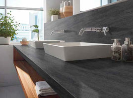 Skinlam Basalt Black SL is a large-format thin porcelain stoneware with a minimum thickness of 3 mm, ideal for façades and interior applications. Inspired by the texture of volcanic basalt, this stone-look porcelain tile is available in three understated shades — black, anthracite, and beige. Its versatility makes it a perfect match for both contemporary and traditional interiors.