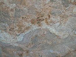 Maple Red Granite, Imperial Red Granite, Dakota Mahogany Granite, Tan Brown Granite, Coffee Brown Granite, Giallo Ornamental Granite, Santa Cecilia Granite.
English:
Immerse yourself in the rich hues of our Red Granite, Brown Granite, and Yellow Granite Collection. From the passionate tones of red to the earthy elegance of brown and the sunlit glow of yellow, our curated selection offers a spectrum of warm colors to elevate your design projects, Quartzite, Basalt.  
German:
Tauchen Sie ein in die reichen Farbtöne unserer Sammlung von Rotgranit, Braungranit und Gelbgranit. Von den leidenschaftlichen Rottönen bis zur erdigen Eleganz des Brauns und dem sonnigen Glanz des Gelbs bietet unsere sorgfältige Auswahl ein Spektrum warmer Farben, um Ihre Designprojekte zu bereichern, Quarzit, Basalt.
Spanish:
Sumérgete en los ricos tonos de nuestra Colección de Granito Rojo, Granito Marrón y Granito Amarillo. Desde los apasionados tonos rojos hasta la elegante tierra del marrón y el resplandor soleado del amarillo, nuestra selección curada ofrece un espectro de colores cálidos para elevar tus proyectos de diseño, Cuarzo, Basalto.
French:
Plongez dans les riches teintes de notre Collection de Granit Rouge, Granit  Marron et Granit  Jaune. Des tons passionnés du rouge à l’élégance terreuse du marron et à l’éclat ensoleillé du jaune, notre sélection soignée offre un éventail de couleurs chaudes pour sublimer vos projets de conception, Quartzite, Basalte.
Italian:
Immergiti nelle ricche sfumature della nostra Collezione di Granito Rosso, Granito Marrone e Granito  Giallo. Dai toni appassionati del rosso all’eleganza terrosa del marrone e al bagliore solare del giallo, la nostra selezione curata offre una gamma di colori caldi per elevare i tuoi progetti di design, Quartzo, Basalto.
Russian:
Погрузитесь в богатые оттенки нашей коллекции красный гранит, коричневый гранит и желтый гранит. От страстных красных тонов до землистой элегантности коричневого и солнечного сияния желтого — наш тщательно подобранный ассортимент предлагает спектр теплых цветов для улучшения ваших дизайнерских проектов, Кварцит, Базальт.
Arabic:
انغمس في الألوان الغنية لمجموعة الجرانيت الأحمر والبني والأصفر. من الألوان الحمراء العاطفية إلى الأناقة الترابية للبني وتوهج الشمس الأصفر، توفر مجموعتنا المختارة طيفًا من الألوان الدافئة لرفع مشاريع التصميم الخاصة بك، الكوارتزيت، البازلت.