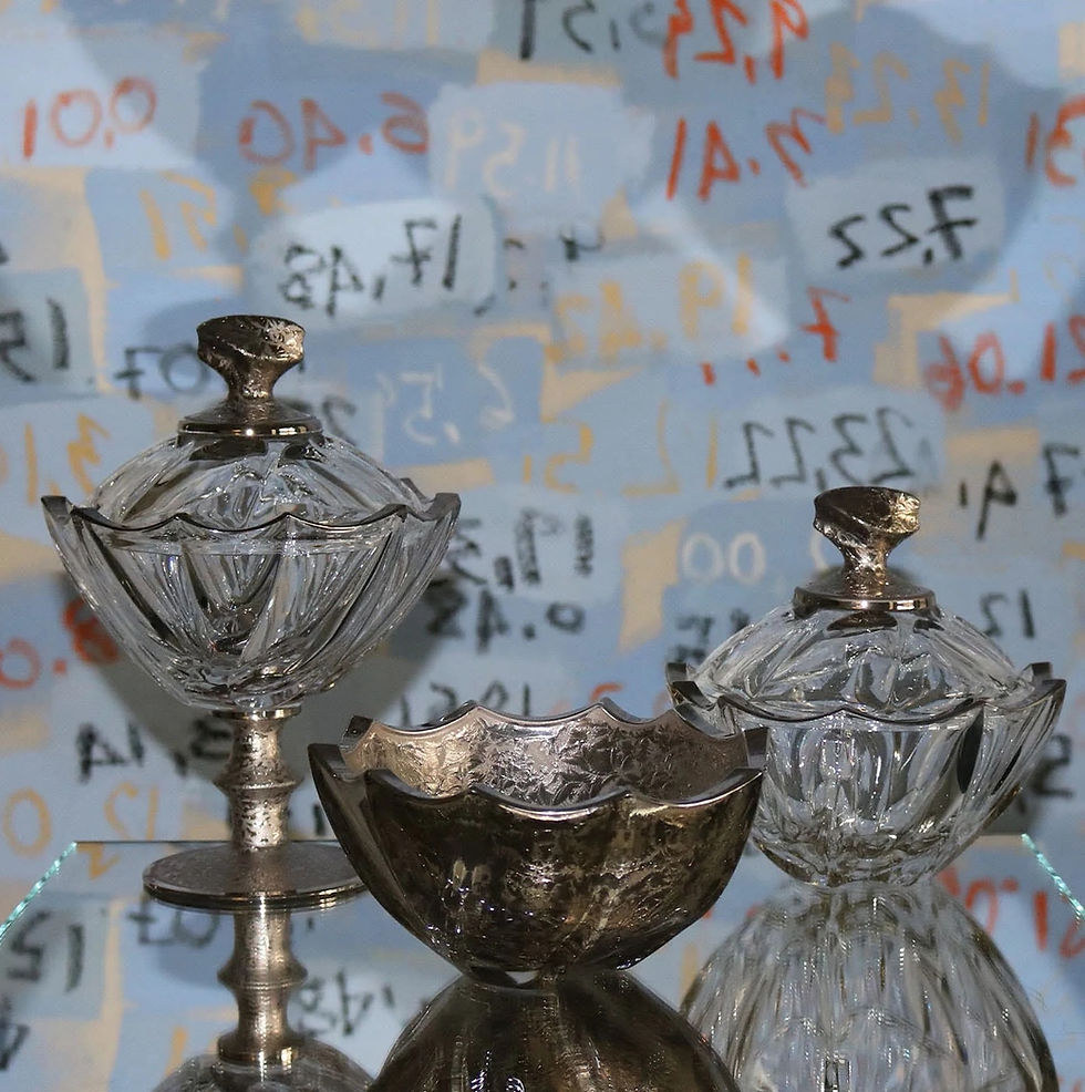 Thumbnail: Trio of Capricio crystal serving bowls and covered candy dishes with platinum details on a reflective glass surface