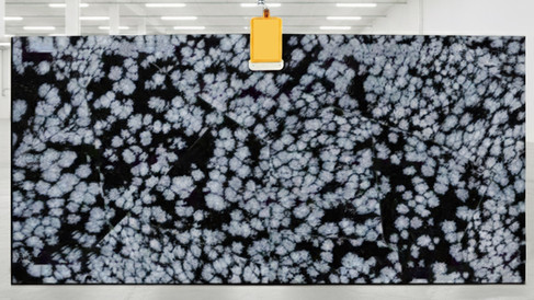 Snowflake obsidian stone slab with high-gloss finish for luxury interiors