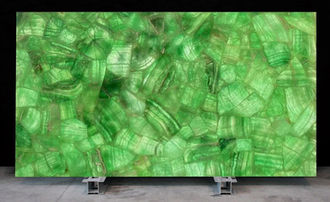 Duramica Glassonyx, Green Fluorite Panels, Grüne Fluoritplatten, Paneles de Fluorita Verde, Panneaux en Fluorite Verte, Pannelli in Fluorite Verde
Enhance your interior with the luminous elegance of Duramica Glassonyx Green Fluorite Panels. The natural gemstone patterns of emerald and fluorite reveal striking depth when illuminated, offering a refined harmony between nature’s artistry and contemporary design for exclusive interiors.
Deutsch:
Verleihen Sie Ihrem Interieur mit den Duramica Glassonyx Grüne Fluoritplatten eine leuchtende Eleganz. Die natürlichen Edelsteinmuster aus Smaragd und Fluorit entfalten bei Beleuchtung eine beeindruckende Tiefe und schaffen eine edle Verbindung von Natur und modernem Design – ideal für anspruchsvolle Innenräume.
Français:
Apportez une touche d’élégance lumineuse à vos intérieurs avec les panneaux Duramica Glassonyx en Fluorite Verte. Les motifs naturels de pierres précieuses, alliant émeraude et fluorite, révèlent toute leur profondeur sous la lumière, créant une harmonie raffinée entre art naturel et design contemporain.
Español:
Aporte elegancia luminosa a su espacio con los paneles Duramica Glassonyx de Fluorita Verde. Los patrones naturales de esmeralda y fluorita se realzan con la iluminación, creando una fusión refinada entre la belleza de la naturaleza y el diseño moderno para interiores exclusivos.
Italiano:
Dona eleganza luminosa ai tuoi interni con i pannelli Duramica Glassonyx in Fluorite Verde. I motivi naturali di smeraldo e fluorite si rivelano in tutta la loro profondità sotto la retroilluminazione, creando un’armonia sofisticata tra natura e design contemporaneo.
العربية (Arabic):
أضف لمسة من الأناقة المضيئة إلى مساحتك مع ألواح Duramica Glassonyx من الفلوريت الأخضر. تكشف أنماط الأحجار الكريمة الطبيعية من الزمرد والفلوريت عمقها المذهل عند الإضاءة، مما يخلق انسجامًا راقيًا بين فن الطبيعة والتصميم العصري للمساحات الراقية.
Русский:
Придайте вашему интерьеру сияющую элегантность с панелями Duramica Glassonyx из зелёного флюорита. Природные узоры изумруда и флюорита раскрывают удивительную глубину при подсветке, создавая утончённое единство природной красоты и современного дизайна для эксклюзивных интерьеров.