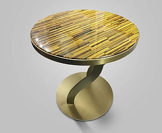 Explora nuestra selección de muebles de piedra y complementos para descubrir cómo el encantador Ojo de Tigre puede enriquecer tu interior con un elegante toque de lujo.