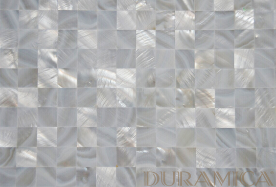 English
Panels made from natural mother-of-pearl. This technological innovation became possible thanks to Duramica technology. A mosaic is created from materials like Mother-of-Pearl, Abalone, and Opal on a ceramic base, resulting in large-format panels ready for interior cladding.
Deutsch
Paneele aus natürlichem Perlmutt. Diese technologische Innovation wurde durch die Duramica-Technologie ermöglicht. Ein Mosaik aus Materialien wie Perlmutt, Abalone und Opal wird auf einer Keramikbasis erstellt und ergibt großformatige Paneele zur Innenverkleidung.
Español
Paneles hechos de nácar natural. Esta innovación tecnológica fue posible gracias a la tecnología Duramica. Se crea un mosaico con materiales como nácar, abulón y ópalo sobre una base cerámica, dando como resultado paneles de gran formato listos para revestimientos interiores.
Français
Panneaux en nacre naturelle. Cette innovation technologique a été rendue possible grâce à la technologie Duramica. Une mosaïque est créée à partir de matériaux tels que la nacre, l’ormeau et l’opale sur une base en céramique, donnant lieu à des panneaux grand format prêts à habiller les intérieurs.
Italiano
Pannelli in madreperla naturale. Questa innovazione tecnologica è stata resa possibile grazie alla tecnologia Duramica. Un mosaico viene realizzato con materiali come madreperla, abalone e opale su una base in ceramica, ottenendo pannelli di grande formato pronti per il rivestimento degli interni.
العربية
ألواح مصنوعة من عرق اللؤلؤ الطبيعي. أصبح هذا الابتكار التكنولوجي ممكنًا بفضل تقنية دوراميكا. يتم إنشاء فسيفساء باستخدام مواد طبيعية مثل عرق اللؤلؤ، والأبالون، والأوبال على قاعدة خزفية، مما ينتج عنه ألواح كبيرة جاهزة لتكسية الجدران الداخلية.
Русский
Панели из натурального перламутра. Эта технологическая инновация стала возможной благодаря технологии Duramica. Мозаика создаётся из таких природных материалов, как перламутр, абалон и опал, на керамической основе. В результате получаются крупноформатные панели, готовые для внутренней облицовки.