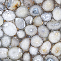 Bring a sophisticated coolness to your design projects with Duramica Glassonyx Gray/Blue Light Agate Panels. The gemstone panels offer a blend of gray and blue hues, ideal for creating modern, serene environments. Deutsch:
Graue und blaue Agat-Paneele fügen dem modernen Innendesign ein ruhiges, aber auffälliges Element hinzu. Das subtile Zusammenspiel von grauen und blauen Farbtönen, verstärkt durch die hinterleuchteten Duramica Glassonyx-Paneele, schafft eine ruhige Atmosphäre in jedem Raum.

Español:
Los paneles de ágata gris y azul añaden un elemento sereno pero impactante al diseño de interiores moderno. La sutil interacción de tonos grises y azules, realzada por los paneles de piedra retroiluminada Duramica Glassonyx, crea una atmósfera tranquila en cualquier espacio.

Français:
Les panneaux en agate grise et bleue ajoutent un élément à la fois serein et frappant au design intérieur moderne. Le subtil jeu de nuances grises et bleues, accentué par les panneaux en pierre rétroéclairée Duramica Glassonyx, crée une atmosphère apaisante dans n’importe quel espace.

Italiano:
I pannelli in agata grigia e blu aggiungono un elemento sereno ma sorprendente al design d’interni moderno. Il sottile gioco di sfumature grigie e blu, accentuato dai pannelli in pietra retroilluminata Duramica Glassonyx, crea un’atmosfera tranquilla in qualsiasi spazio.

العربية:
تضيف ألواح الأباتيت الرمادي والأزرق عنصراً هادئاً ولكنه لافت في تصميم الديكور الداخلي العصري. التفاعل الدقيق بين الظلال الرمادية والزرقاء، المعزز بواسطة ألواح الحجر الخلفي Duramica Glassonyx، يخلق جوًا هادئًا في أي مساحة.

Русский:
Серые и синие агатовые панели добавляют спокойный, но выразительный элемент в современный дизайн интерьера. Тонкое взаимодействие серых и синих оттенков, подчеркнутое подсветкой камня Duramica Glassonyx, создает спокойную атмосферу в любом пространстве.
