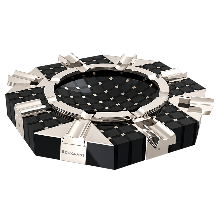 Top view of a premium octagonal black obsidian mosaic cigar ashtray with a symmetrical checkered pattern and round platinum r
