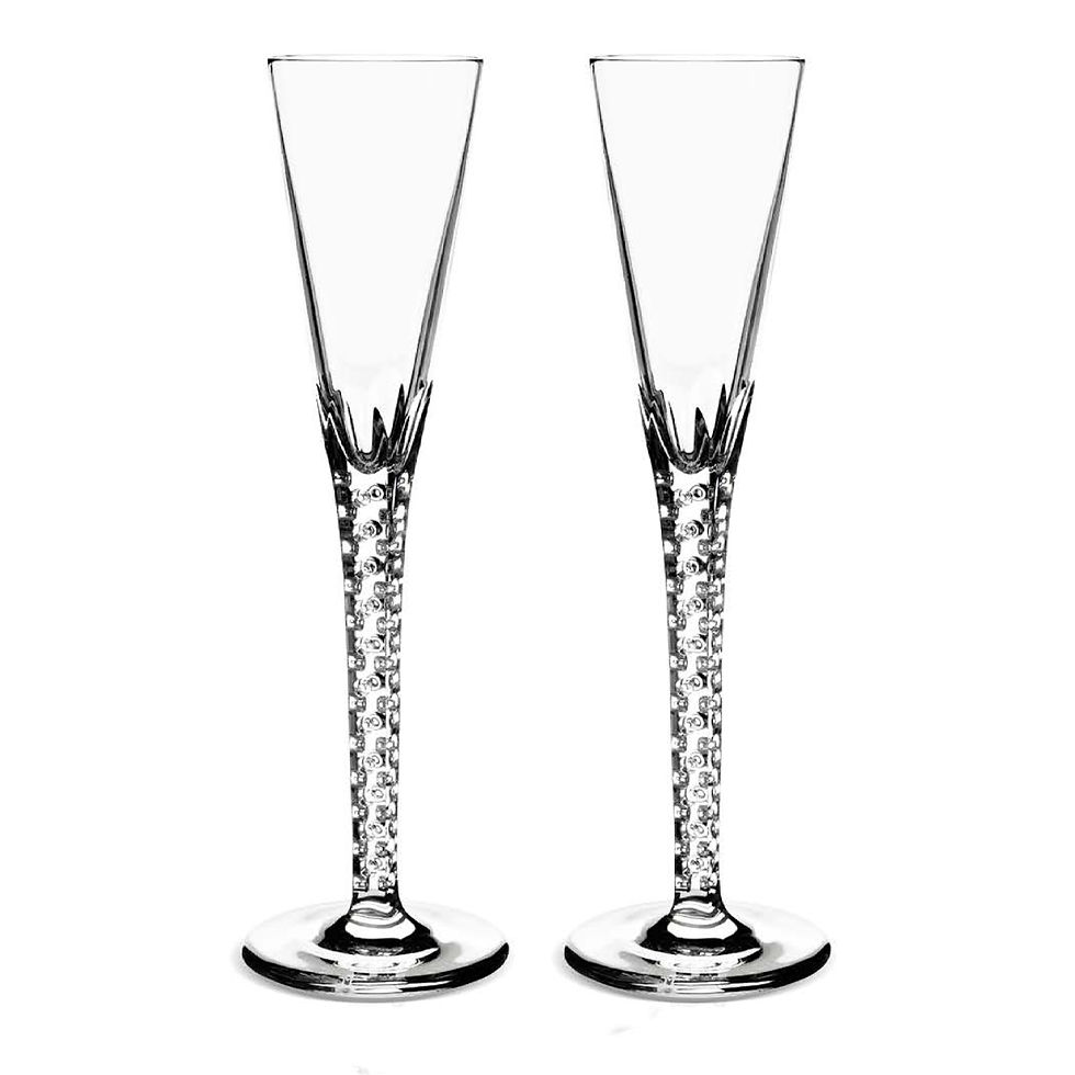 Pair of handcrafted Perlage clear crystal champagne flutes with crown-detailed bases and textured stems on a white background