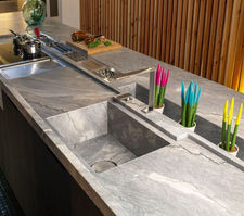 EN
Grey Nuvolato granite is distinguished by its swirling grey tones and cloudy patterns, adding a dynamic and refined look to any surface. Ideal for countertops, flooring, and wall applications, this durable granite offers both elegance and strength.
DE
Grey Nuvolato Granit zeichnet sich durch wirbelnde Grautöne und wolkige Muster aus, die jeder Oberfläche eine dynamische und elegante Note verleihen. Ideal für Arbeitsplatten, Fußböden und Wandverkleidungen – langlebig und stilvoll zugleich.
ES
El granito Grey Nuvolato se caracteriza por sus tonos grises en forma de nubes, que aportan un aspecto dinámico y sofisticado a cualquier superficie. Ideal para encimeras, suelos y revestimientos, combina durabilidad con elegancia.
FR
Le granit Grey Nuvolato se distingue par ses nuances de gris tourbillonnantes et ses motifs nuageux, offrant un rendu dynamique et raffiné. Parfait pour plans de travail, sols ou murs – robuste et élégant.
IT
Il granito Grey Nuvolato presenta tonalità grigie mosse e venature nuvolate, donando un aspetto dinamico e raffinato a qualsiasi superficie. Ideale per piani cucina, pavimenti e rivestimenti – resistente ed elegante.
AR
يتميّز غرانيت Grey Nuvolato بتدرجاته الرمادية المتداخلة ونقوشه السحابية، ما يمنحه مظهراً ديناميكياً وراقياً لأي سطح. مثالي لأسطح المطبخ والأرضيات والجدران – يجمع بين المتانة والأناقة.
RU
Гранит Grey Nuvolato отличается вихревыми серыми оттенками и облачными узорами, придавая поверхностям динамичный и элегантный вид. Идеально подходит для столешниц, полов и облицовки стен — сочетает прочность и утончённость.
⸻