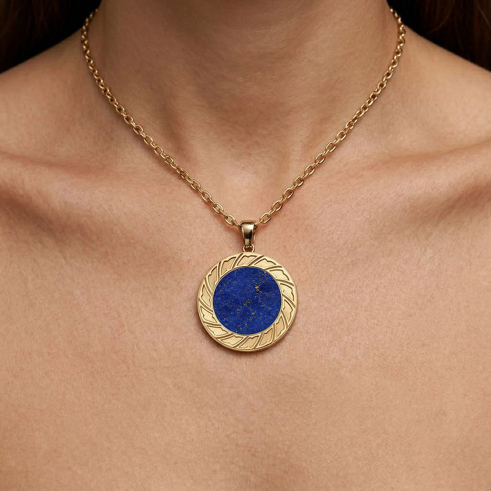 Thumbnail: Model in a denim jacket wearing Lapis Lazuli small white gold pendant necklace for a casual look. Altın kolye ucu. دلاية ذهب