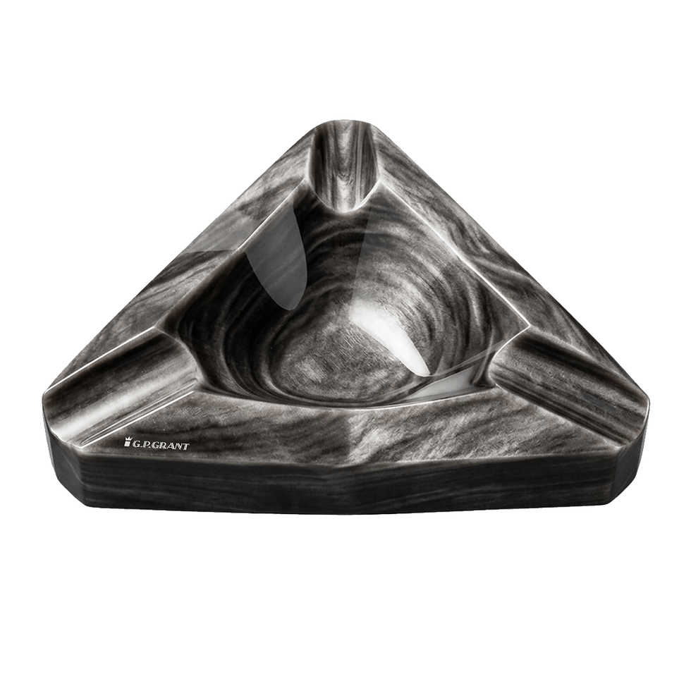triangular cigar ashtray in Silver Obsidian, featuring natural linear volcanic glass patterns