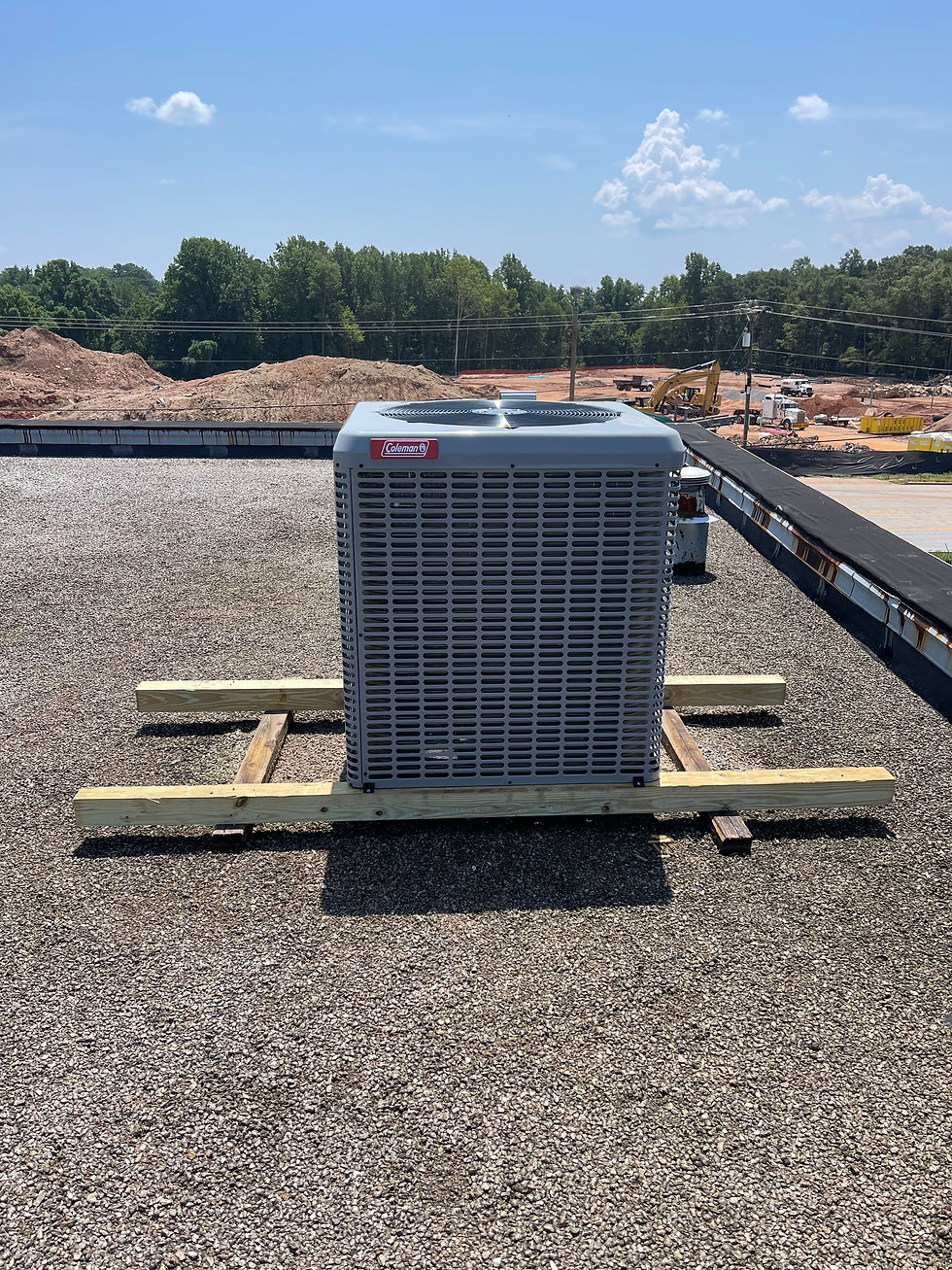 Close-up view of HVAC system components being cleaned during maintenance
