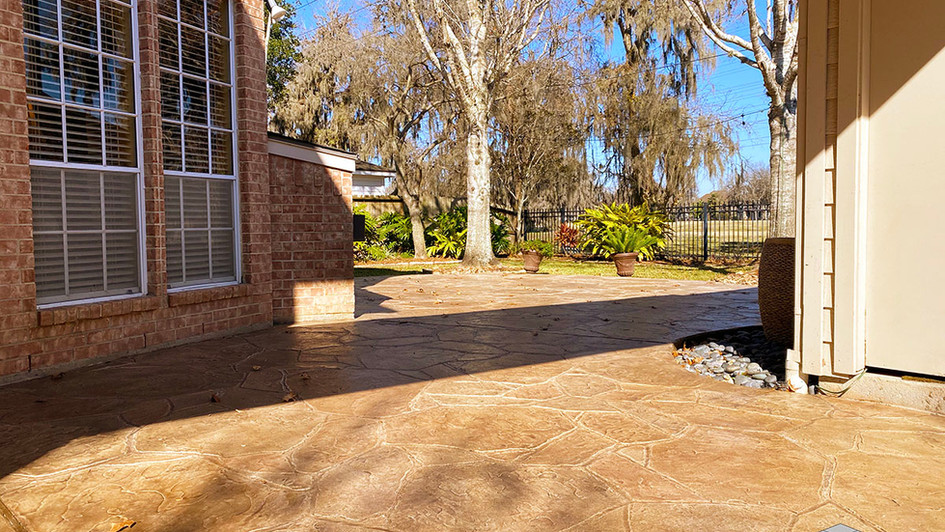 A Stamped Concrete Overlay in a Beautiful Natural Beige Arizona Flagstone Pattern over this Driveway