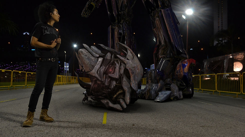 Standing beside the Transformers