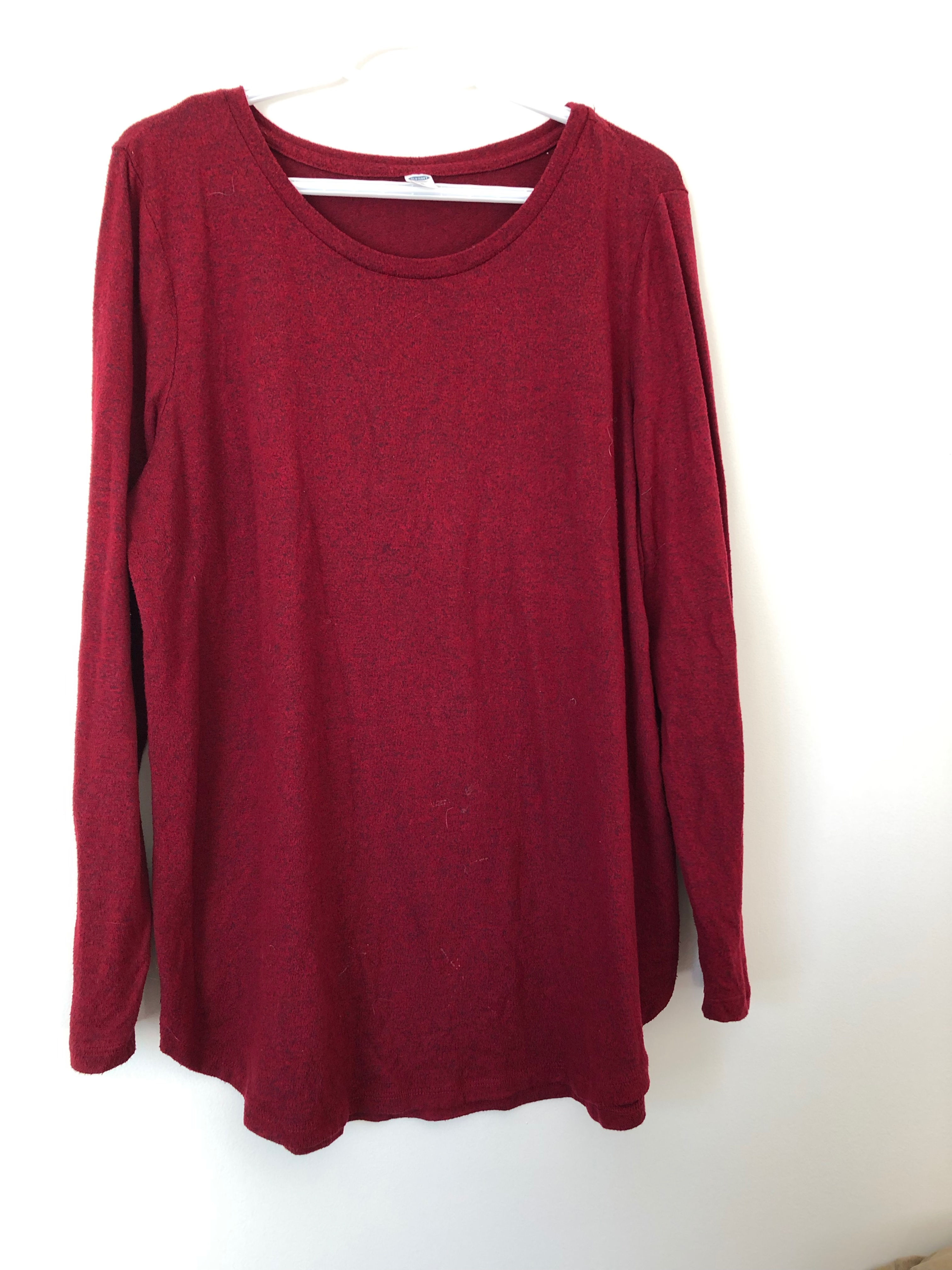 XL, red with black sweater.