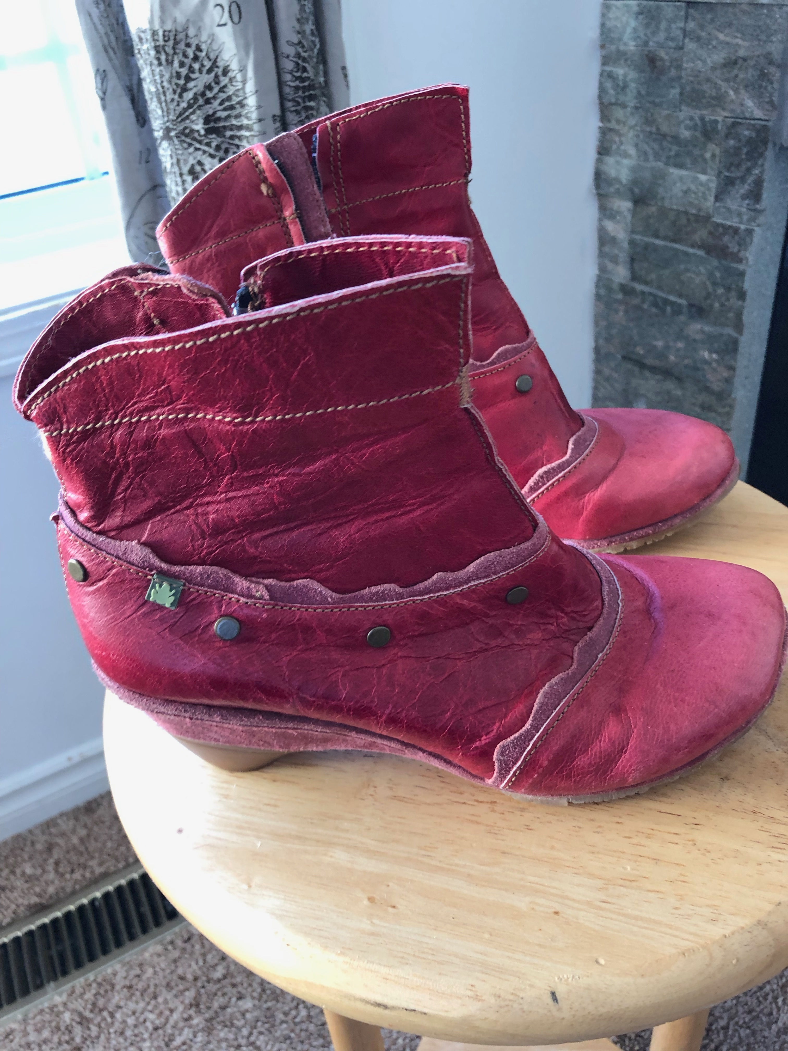 Size 7, red leather boot.