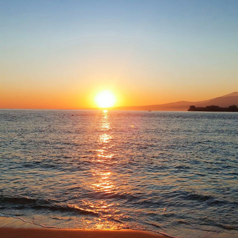 Sunrise on Gili Air: When the Golden of Dawn Kisses the Calm Waters Around the Sea. 