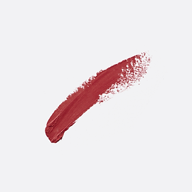 Lápiz labial rojo de la mancha