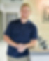 Dr. Bryan Hammer in the front office of the Movement Chiropractic Office near Coweta County, GA