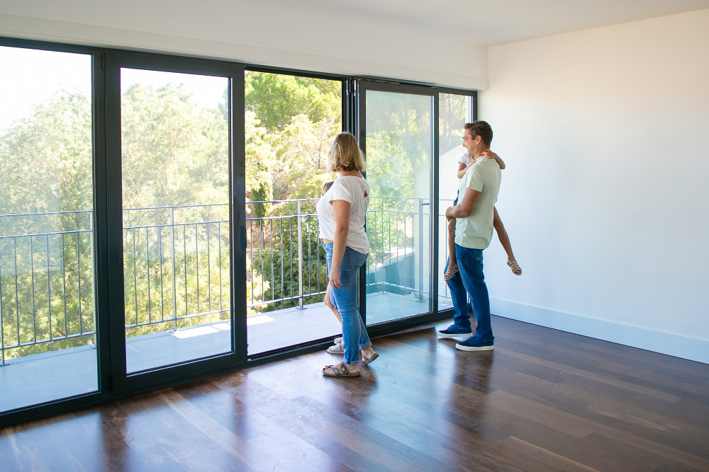 Family looking out of double glazing